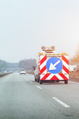 Urban roadwork truck directing traffic flow