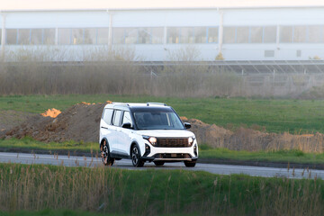 Zero emission car on rural highway journey