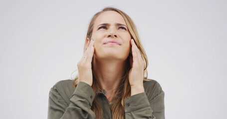 Headache, pain and woman in studio upset with tension, pressure and brain fog on white background....