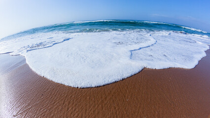 Beach Sand Wave White Water Wash Blue Ocean Horizon Close-Up Photograph