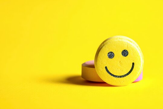 smiley face on yellow background - Powered by Adobe