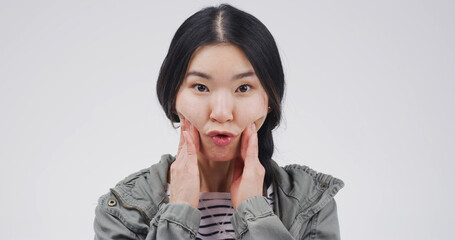 Studio, portrait and woman with funny face, comic or facial expression for humor, gesture or silly....