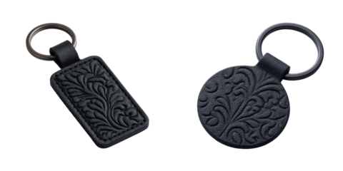 Two textured transparent leather keychains, one rectangular and one circular, with floral designs.
