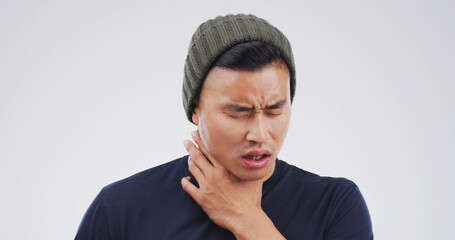 Man, sore throat and stress with pain in studio, frustrated or burnout with flu on white...