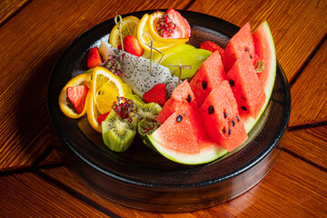 A delightful assortment of vibrant fruits displayed beautifully, inviting a refreshing experience