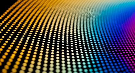 Obraz premium Abstract Close-Up of Illuminated Gradient Dot Pattern with Vibrant Color Transition and Diagonal Wave Flow on Dark Background