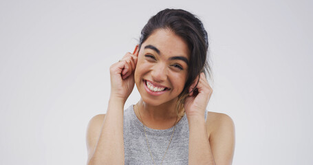 Portrait, funny face and woman with humor, playful or facial expression for comedy, studio or...