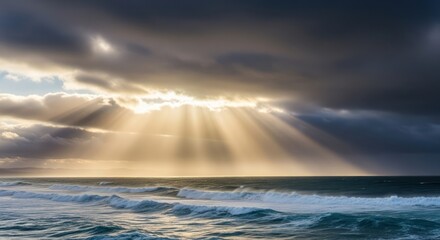 Dramatic ocean scene with sun rays piercing through dark, stormy clouds.