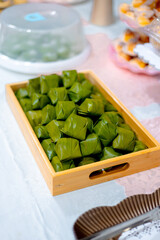 Steamed glutinous rice dumplings in banana leaf tray Malay