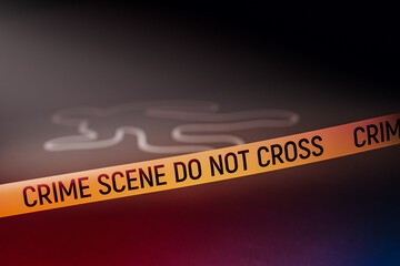 Outline of human's body is drawn on a dark wooden floor background. Crime scene concept. The black background adds a sense of darkness. 3d render