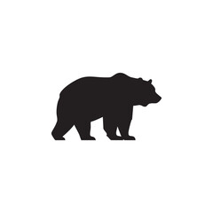 Fototapeta premium Black silhouette of a bear walking on a white background isolated on white background silhouette