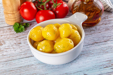 Boiled young potato with oil