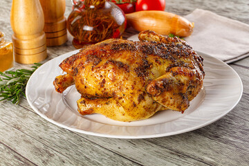 Baked in oven whole chicken with spices