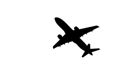 Obraz premium Silhouette of an airplane against a sky.