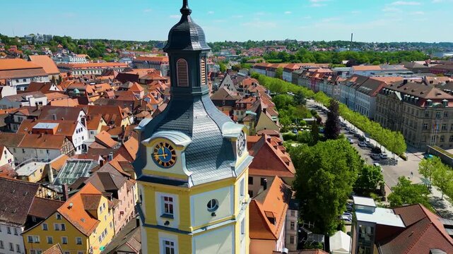 4K Aerial Drone Video of the Historic Herrieder Clock Tower in the Old Town area of Downtown Ansbach, Germany