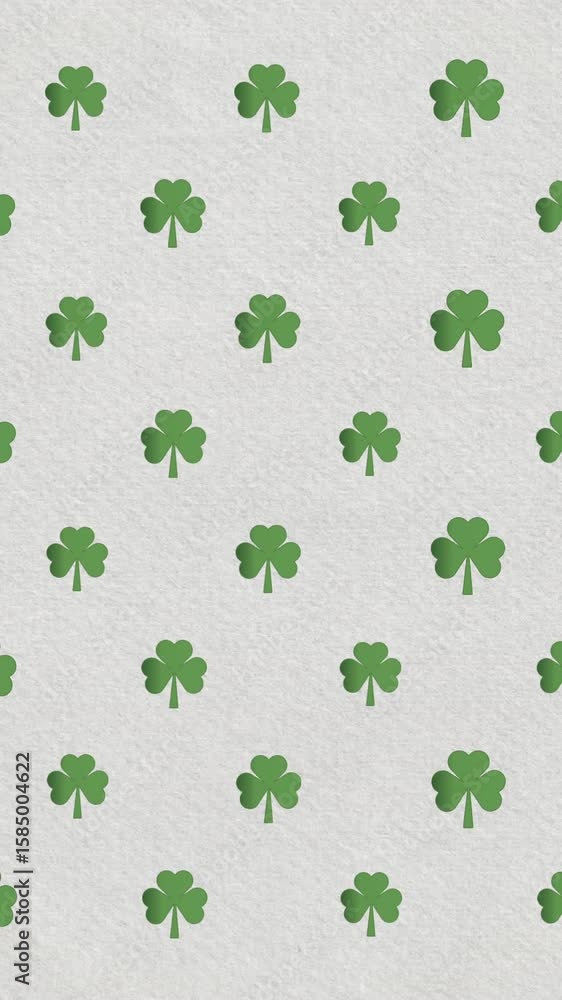 Poster digital animation of multiple clover leaves moving against irish flag