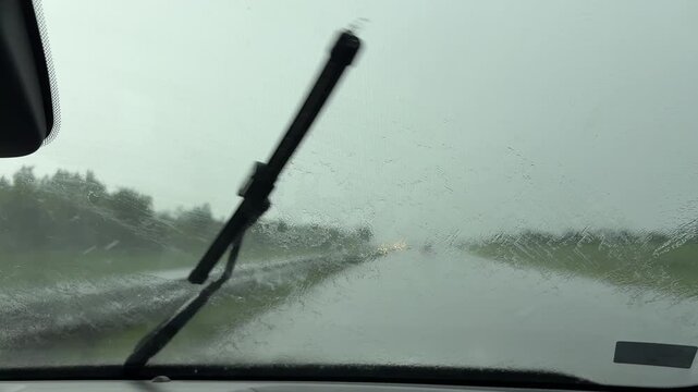 Windshield wipers are battling an intense downpour