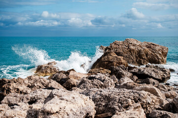Waves Crashing on Rocky Coastline