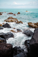 Waves Crashing on Rugged Coastal Rocks