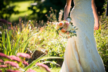 Bride Holding Bouquet in Sunlit Garden – Newport, Rhode Island