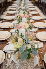 Romantic Wedding Reception Table with Floral Centerpieces