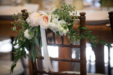 Floral Chair Back Decoration with Peach and White Flowers