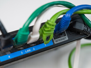 Colorful Ethernet Cables Connected to a Router. 