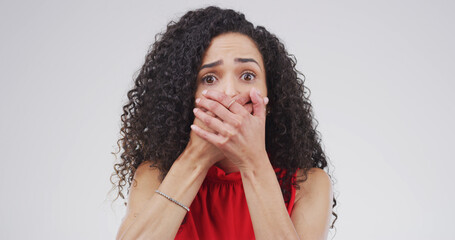 Portrait, shocked and woman in studio, scared and announcement on white background. Person, phobia...