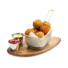 Delicious fried croquette balls with parsley and sauces isolated on white