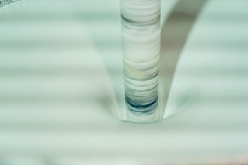 Industrial elegance - capturing the precise moment of acrylic paint production. The cycle of...