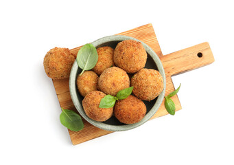 Delicious fried croquette balls with basil in bowl isolated on white, top view