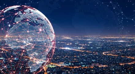 Globe with network connections over a cityscape at night showing global connectivity technology concept