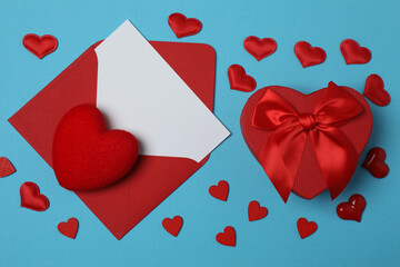 gift box and envelope with space for text on blue background