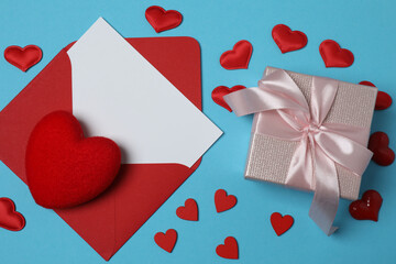 gift box and envelope with space for text on blue background