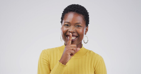 Hush, portrait and silence with black woman on studio space for gossip, secret or privacy. Emoji,...