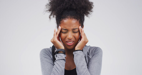 Headache, pain and black woman in studio upset with tension, pressure and brain fog on white...