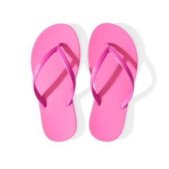 Bright pink flip flops on white background