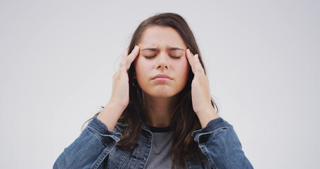Headache, pain and woman in studio, stress and frustrated with anxiety on white background. Person,...