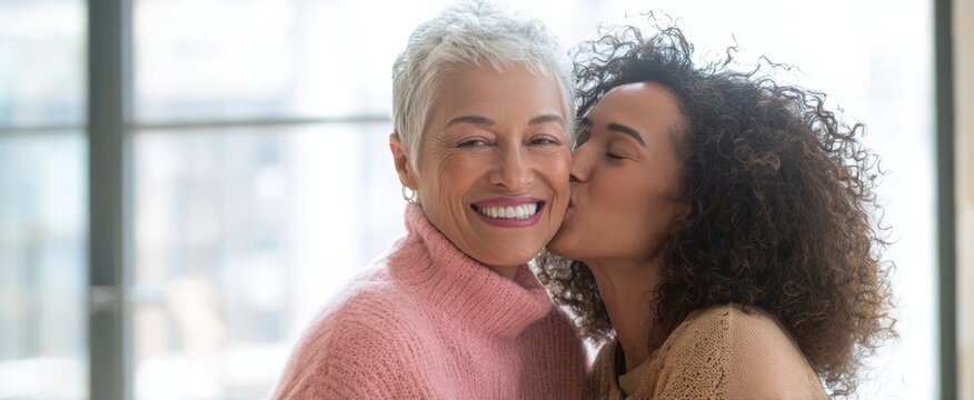 The joyful moments of a loving mother and daughter sharing a heartfelt kiss. - Powered by Adobe