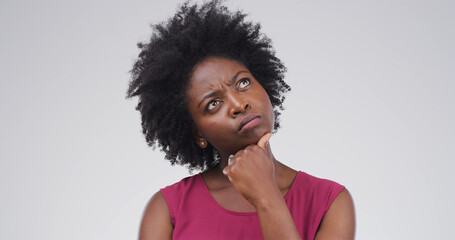 Why, thinking and black woman with question in studio for suspicious news, confused or doubt....