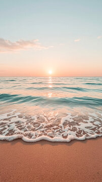 A serene beach scene at sunset with calm ocean waves rolling onto the sand The sun's warm light reflects on the water creating a peaceful atmosphere with soft clouds in the sky