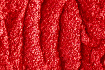 Red berry yogurt ice cream. Fresh fruit smoothie with strawberries, raspberries, pomegranate and red currants. Ice cream texture. Delicious sweet dessert close-up as a background.