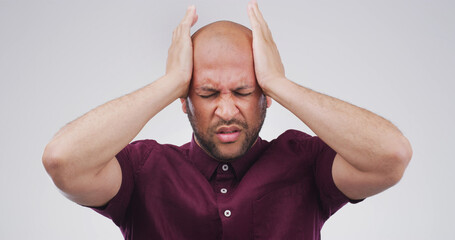 Stress, headache and pain with man in studio for debt crisis, emergency and trading loss....