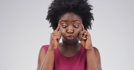 Cross eyes, silly and black woman in studio with funny face for emoji, comedy and humor. Mockup...
