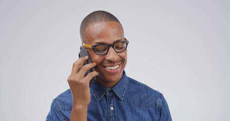 Happy, black man and talking with phone call in studio for campaign feedback, good news or chat....