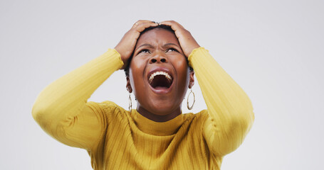 Scream, angry and black woman in studio with pain for mistake, crisis and problem on white...