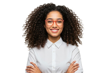 A young brazilian woman with curly black hair and pink glasses smiles confidently with her arms crossed, isolated on a transparent background