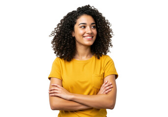 A confident young woman with curly hair smiles and looks away with crossed arms, isolated on transparent background