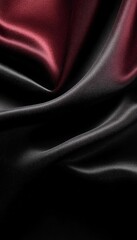 Fototapeta premium Luxurious dark silk fabric waves and swirls in rich shades of black and red, embodying elegance.