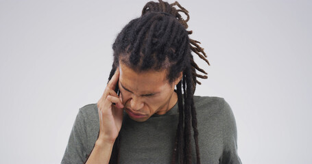 Stress, headache and man in studio with burnout, exhaustion or pain for mental health. Frustration,...